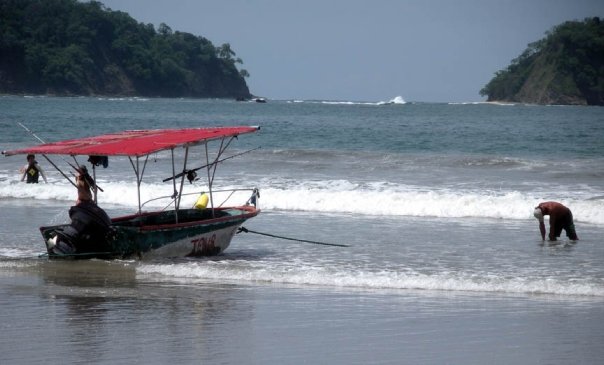 Nosara Costa Rica boating on tropical beach